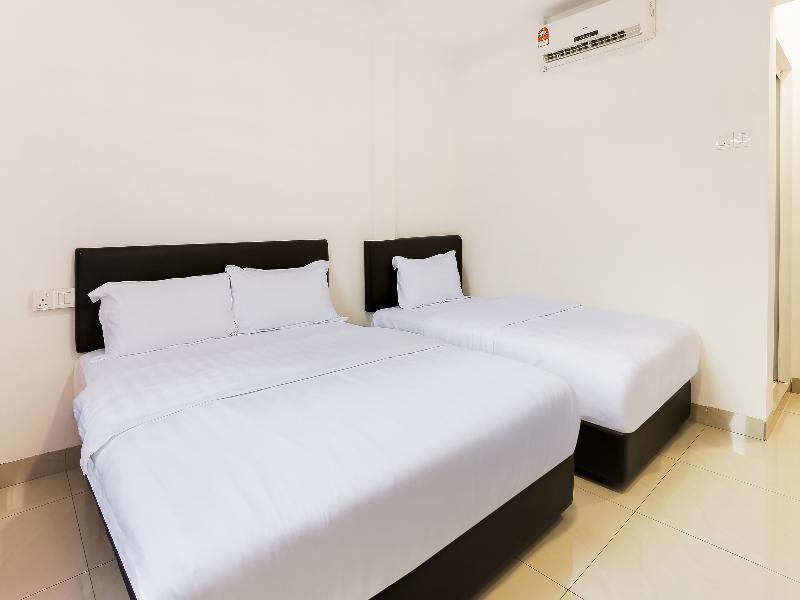 Super Oyo 89495 Rich Hotel Air Hitam Luaran gambar