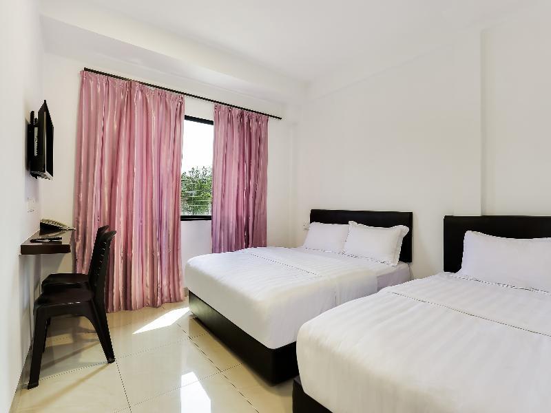 Super Oyo 89495 Rich Hotel Air Hitam Luaran gambar