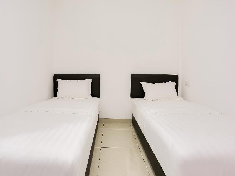 Super Oyo 89495 Rich Hotel Air Hitam Luaran gambar