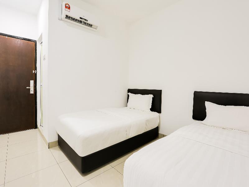 Super Oyo 89495 Rich Hotel Air Hitam Luaran gambar